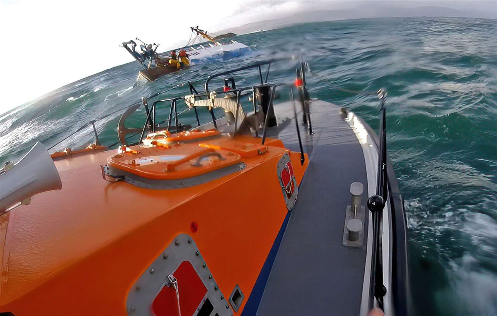 The fishing vessel began listing to the side before sinking (RNLI Oban HelmetCam/PA)