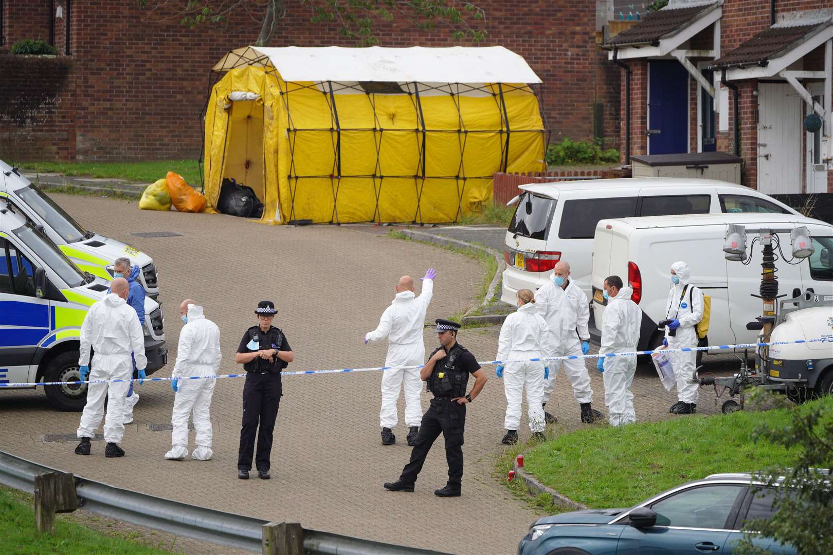 Forensic officers in Biddick Drive in the Keyham area of Plymouth where six people, including the offender, died of gunshot wounds (Ben Birchall/PA)