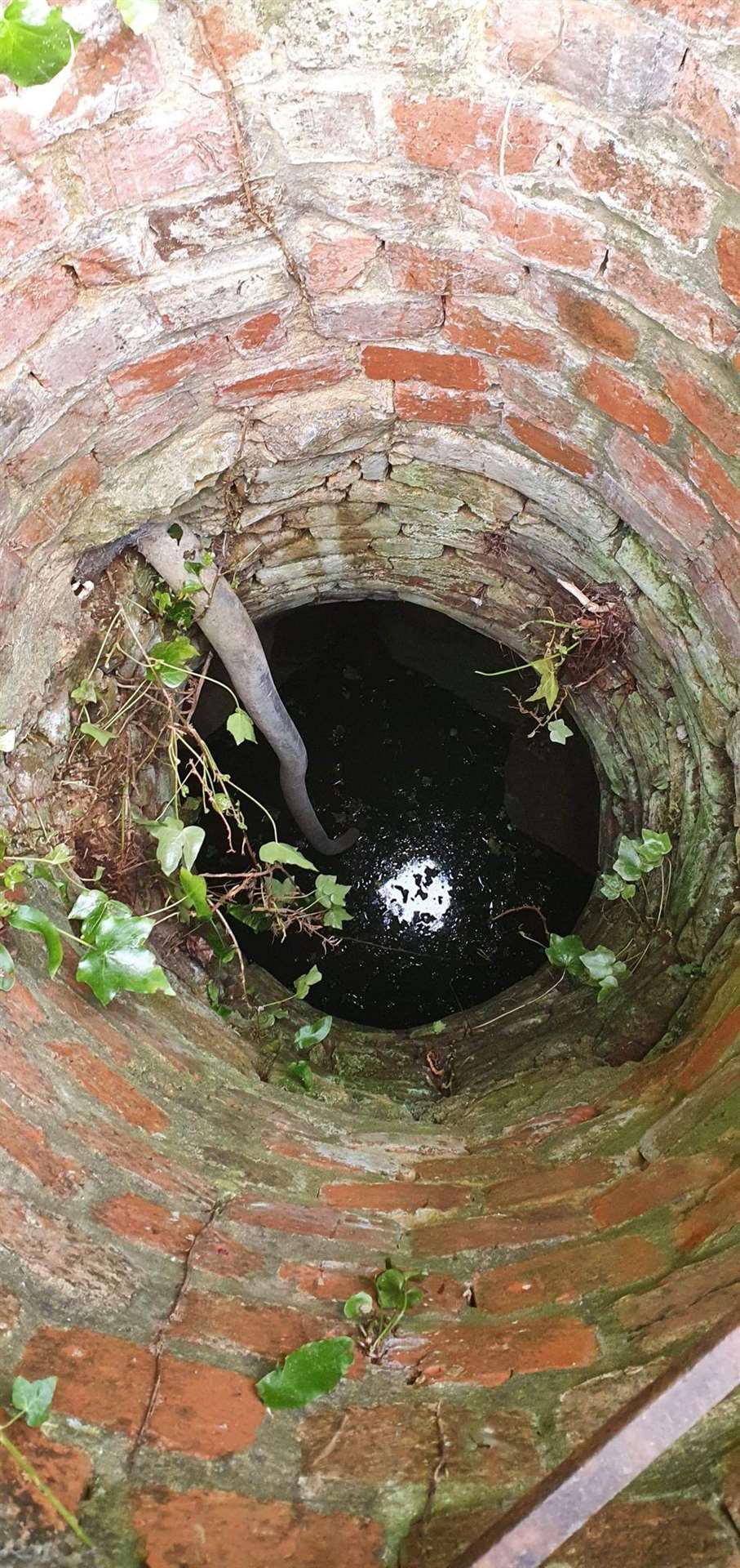 The well has about 12 inches of water at the bottom (Freya Hill/PA)