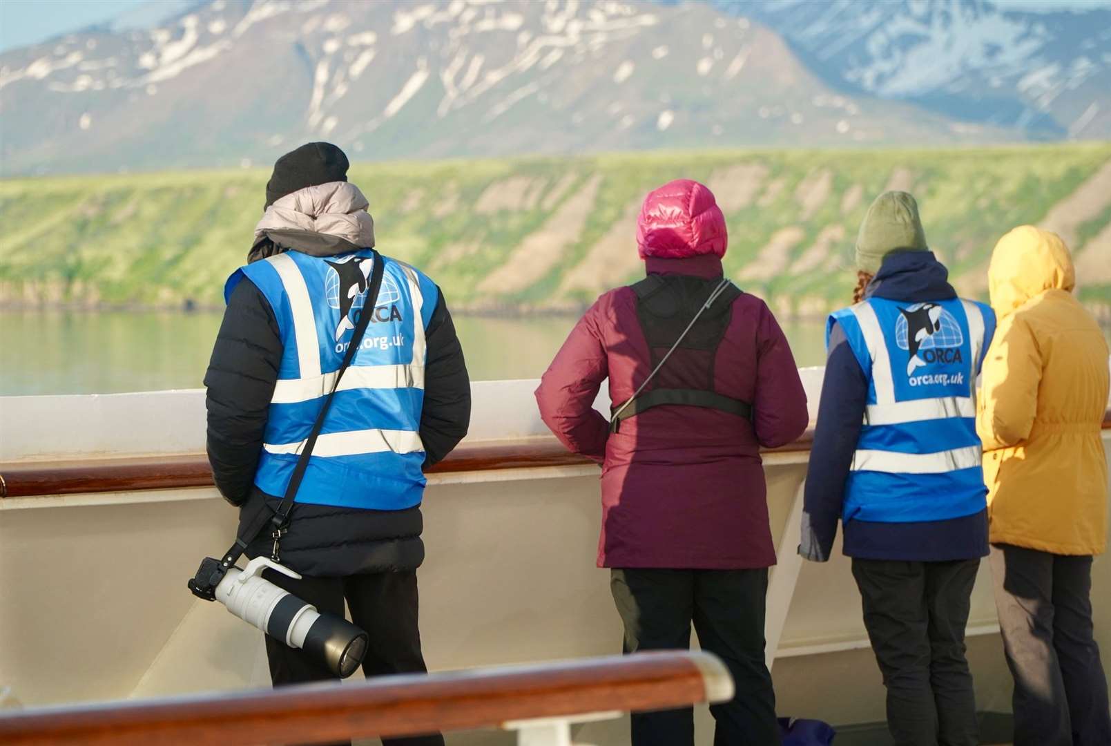 Experts from Orca watching out for whales from the ship