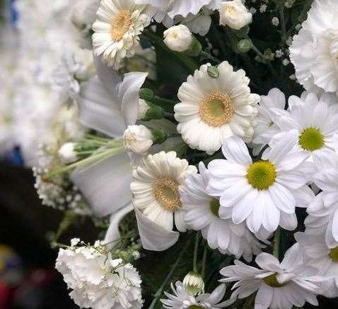 Flowers presented at Mr Crow's funeral by his family