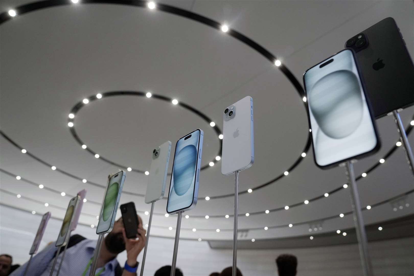 iPhone 15 and 15 Plus models displayed during an announcement of new products on the Apple campus in Cupertino, California (Jeff Chiu/AP)