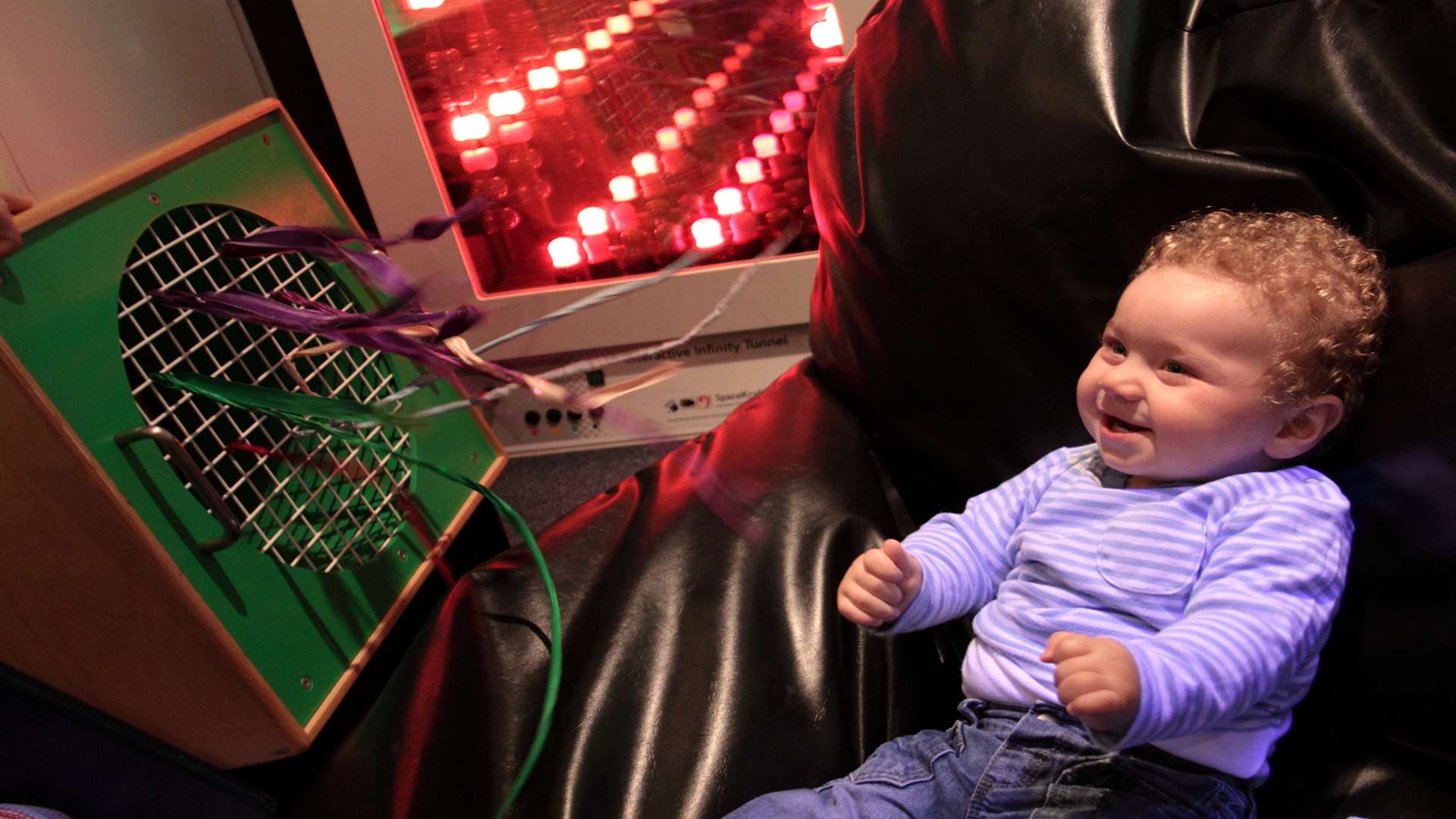 Rowan enjoys the sensory room at Allsworth Court.