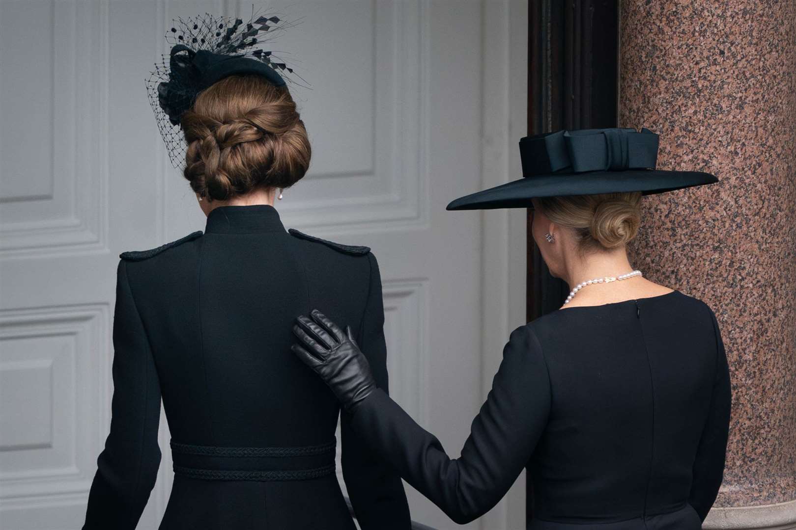 The Princess of Wales (left) and Duchess of Edinburgh leave the balcony at the Foreign Office on Remembrance Sunday (Stefan Rousseau/PA)