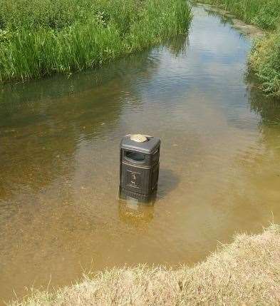 A bin was thrown into the river on the Little Burton estate. Picture: Chris Ferguson