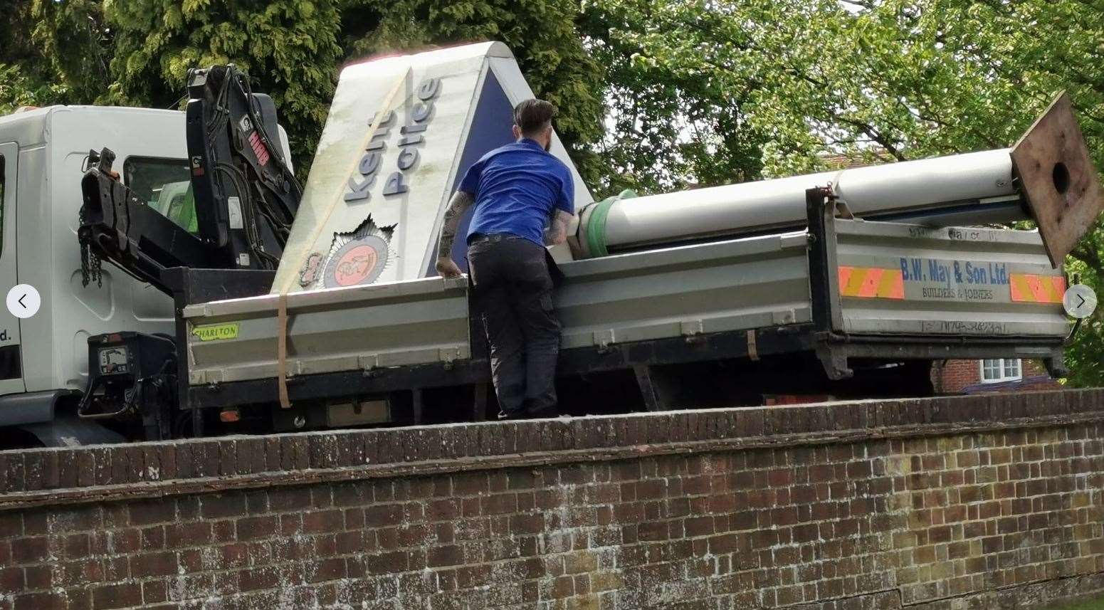 The Kent Police sign being removed from the Sutton Road HQ in Maidstone. Pic Marica Brunger