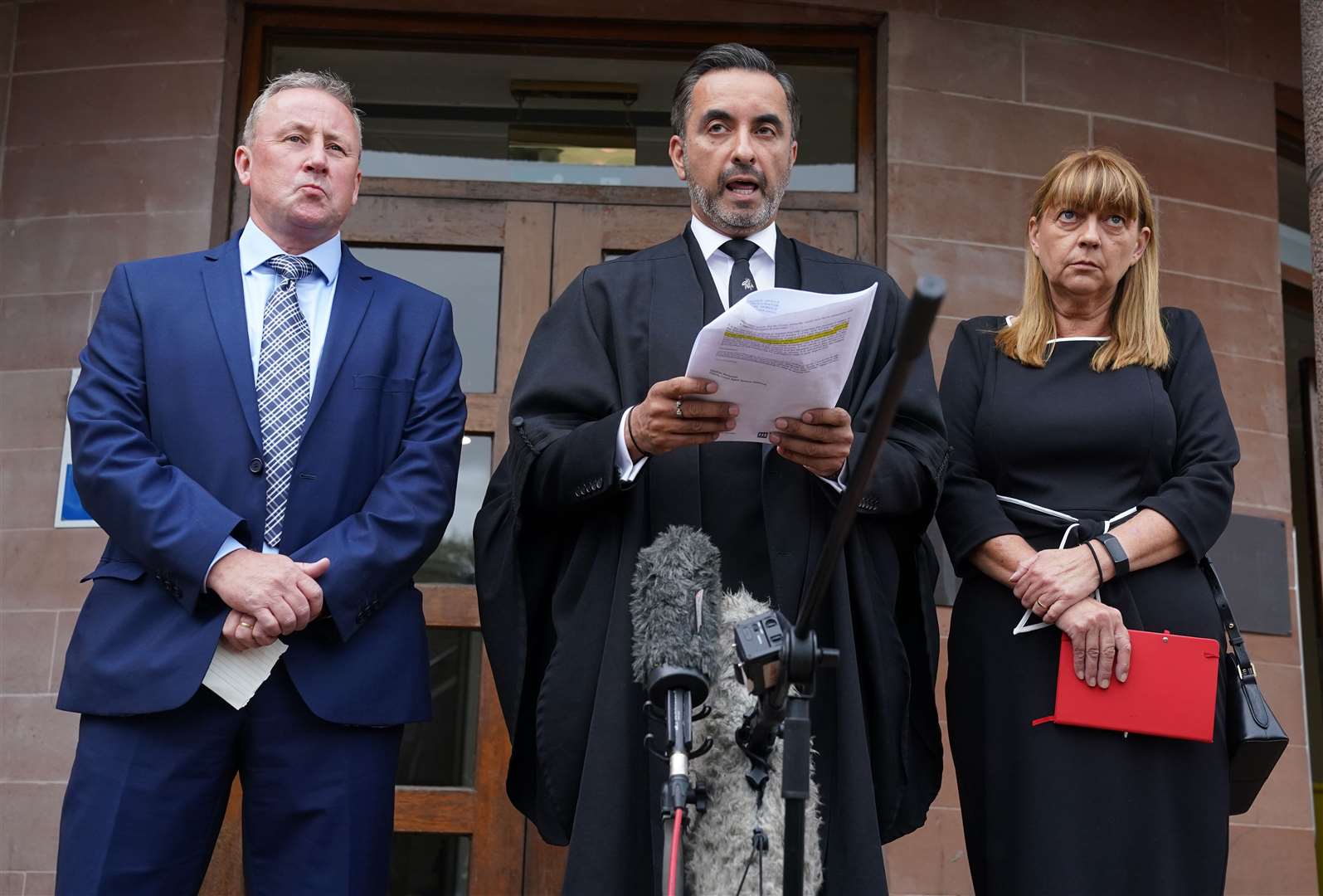 Katie Allan’s parents Linda and Stuart, pictured with solicitor Aamer Anwar, will give evidence to the FAI (PA)