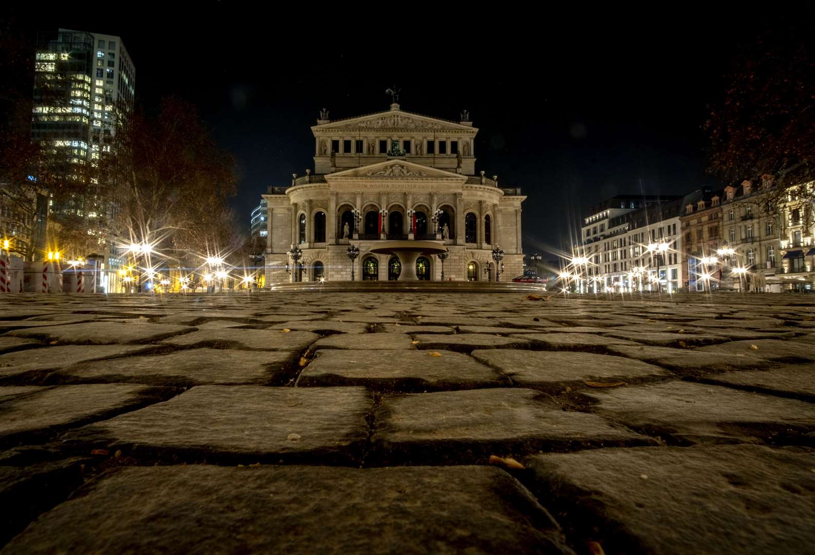 The empty square in front of the Old Opera in Frankfurt as lockdowns continue in Germany (Michael Probst/AP)