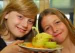 Shakira Cole,11 and Jessica Cassidy,10, with their swan made from an apple and orange