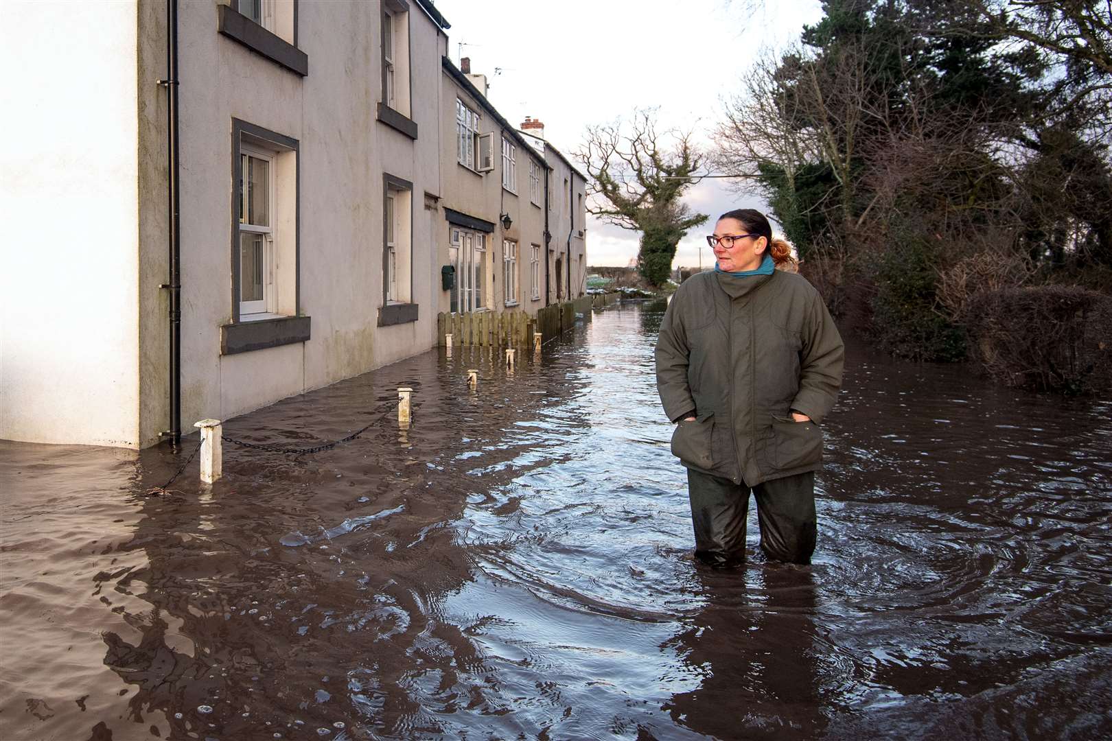 Gabrielle Burns-Smith outside her flooded home (Joe Giddens/PA)