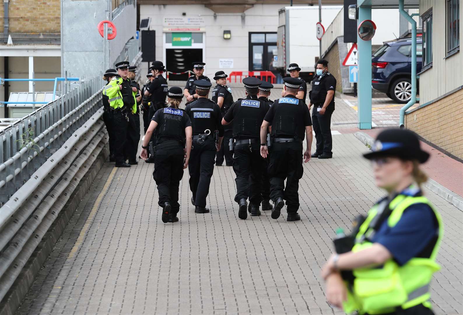 Police at the Royal Sussex County Hospital in Brighton after a member of hospital staff was stabbed (Gareth Fuller/PA)