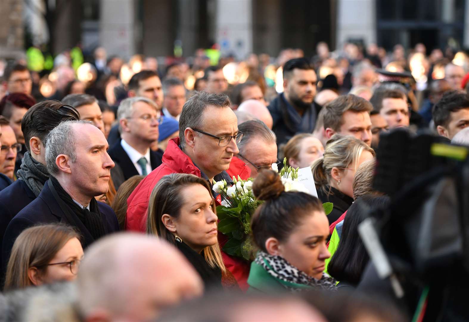 A vigil to honour the victims of the Fishmonger’s Hall terror attack, as well as the members of the public and emergency services who risked their lives to help others (Dominic Lipinski/PA)