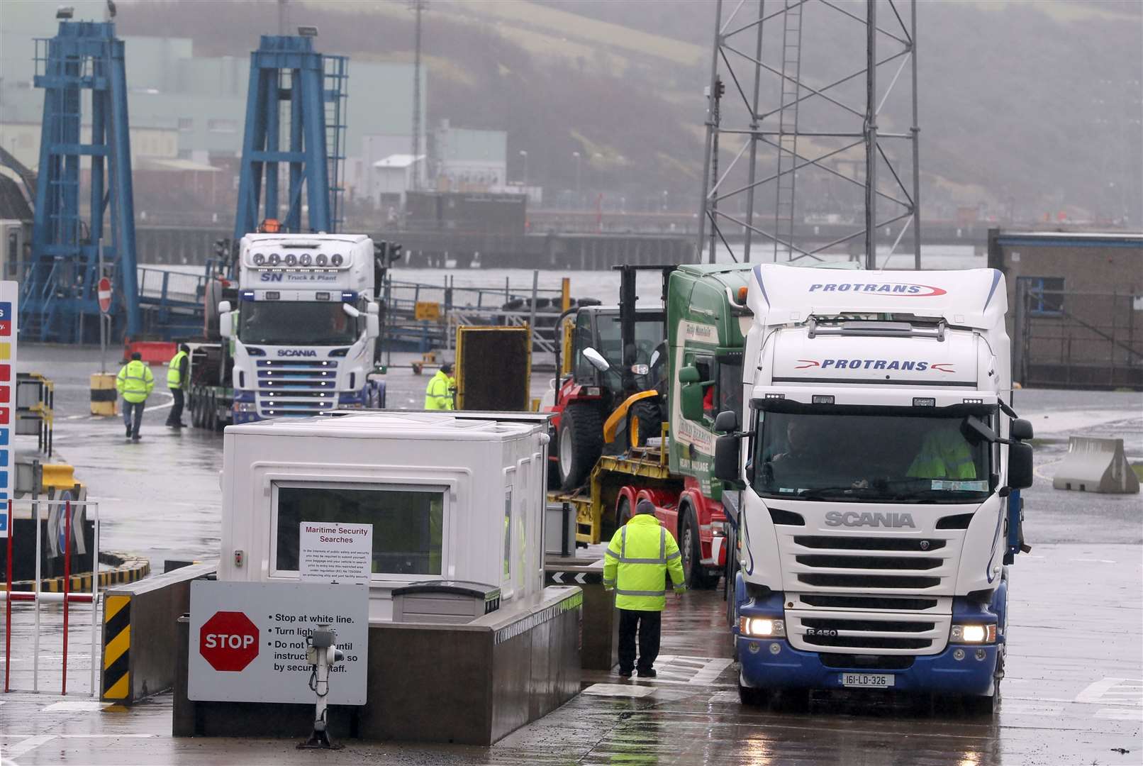 Trucks arriving from Scotland leaving Larne Port (Brian Lawless/PA)