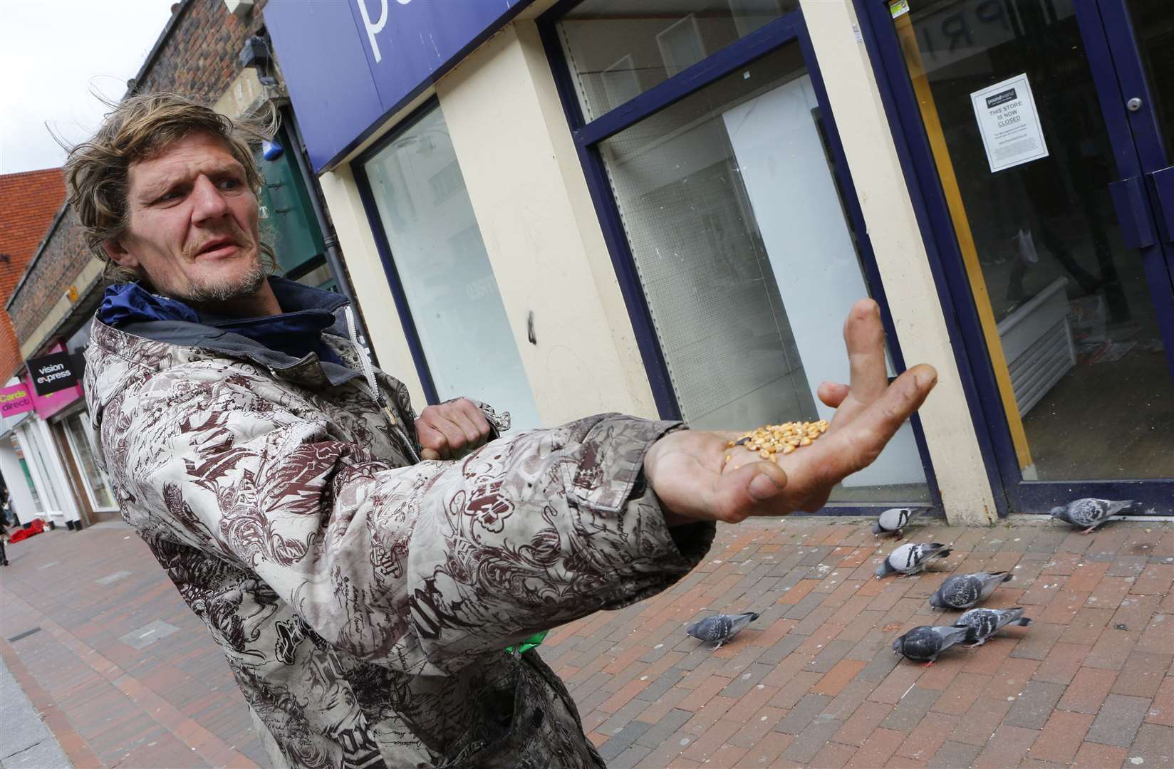 Homeless man Gui Care who also feeds the pigeons in Chatham High Street. Picture: Andy Jones