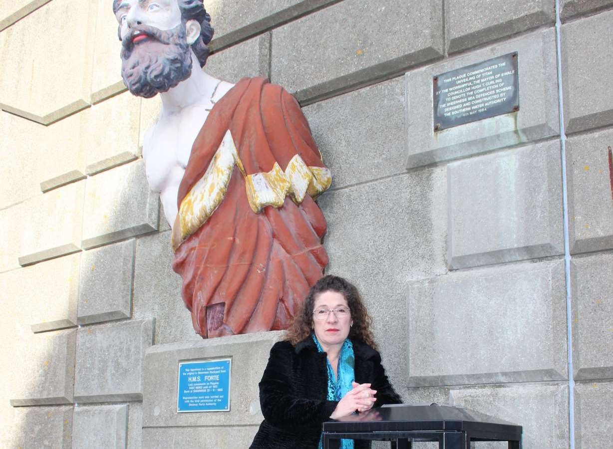 Amanda Green with Titan and the dog waste bin in Marine Parade, Sheerness