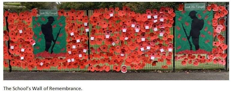 Pupils at Minster Primary School in Brecon Chase had their own cenotaph for their Remembrance Day wreath-laying. They all made poppies and fixed them to a fence in the playground