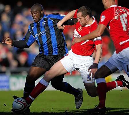 Bayo Akinfenwa powers past Crewe players