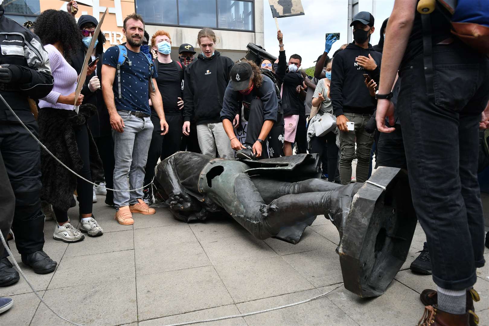 Protesters dragging the statue of Edward Colston to Bristol harbourside during a Black Lives Matter protest rally in memory of George Floyd (Ben Birchall/PA)