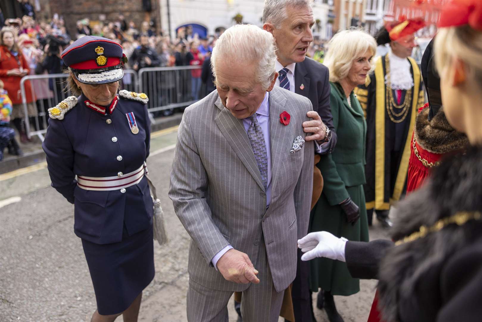 Charles barely reacted after an egg is thrown in his direction at Micklegate Bar (James Glossop/The Times/PA)