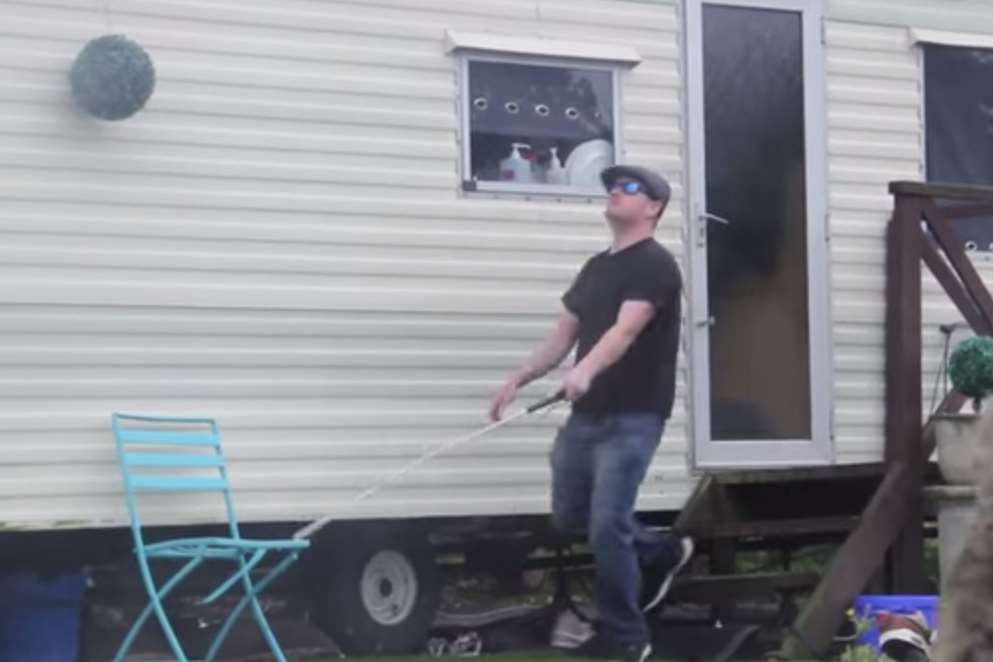 The prankster is seen leaving a mobile home