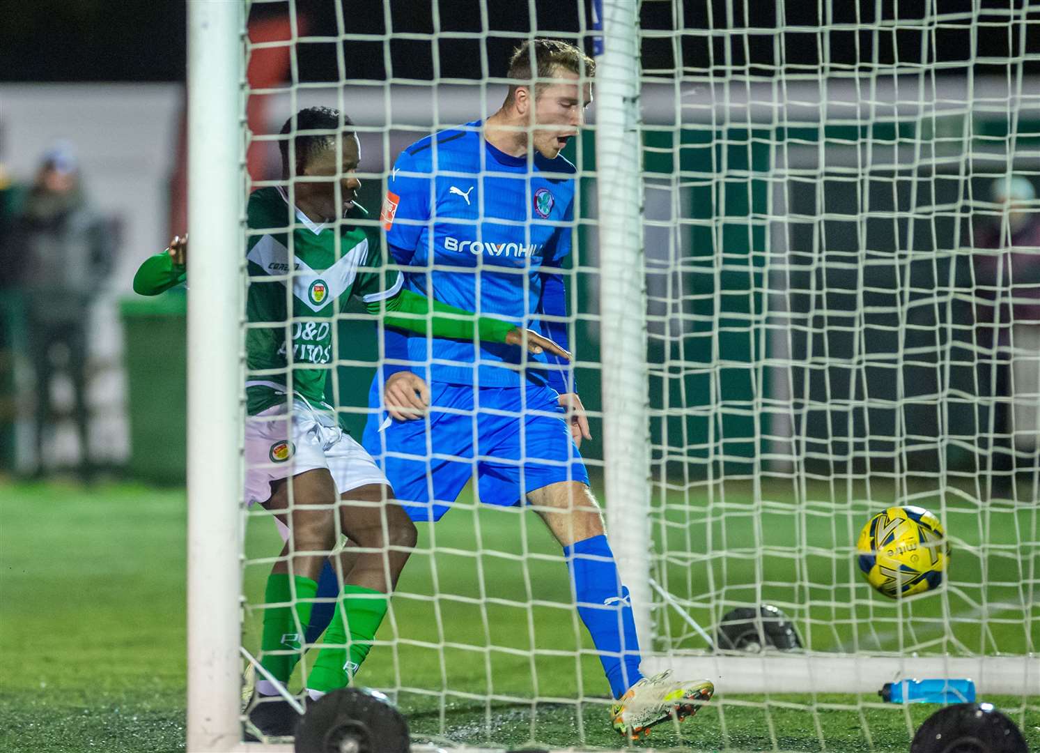 Omarr Lawson bundles home Ashford's 89th-minute leveller against Beckenham. Picture: Ian Scammell