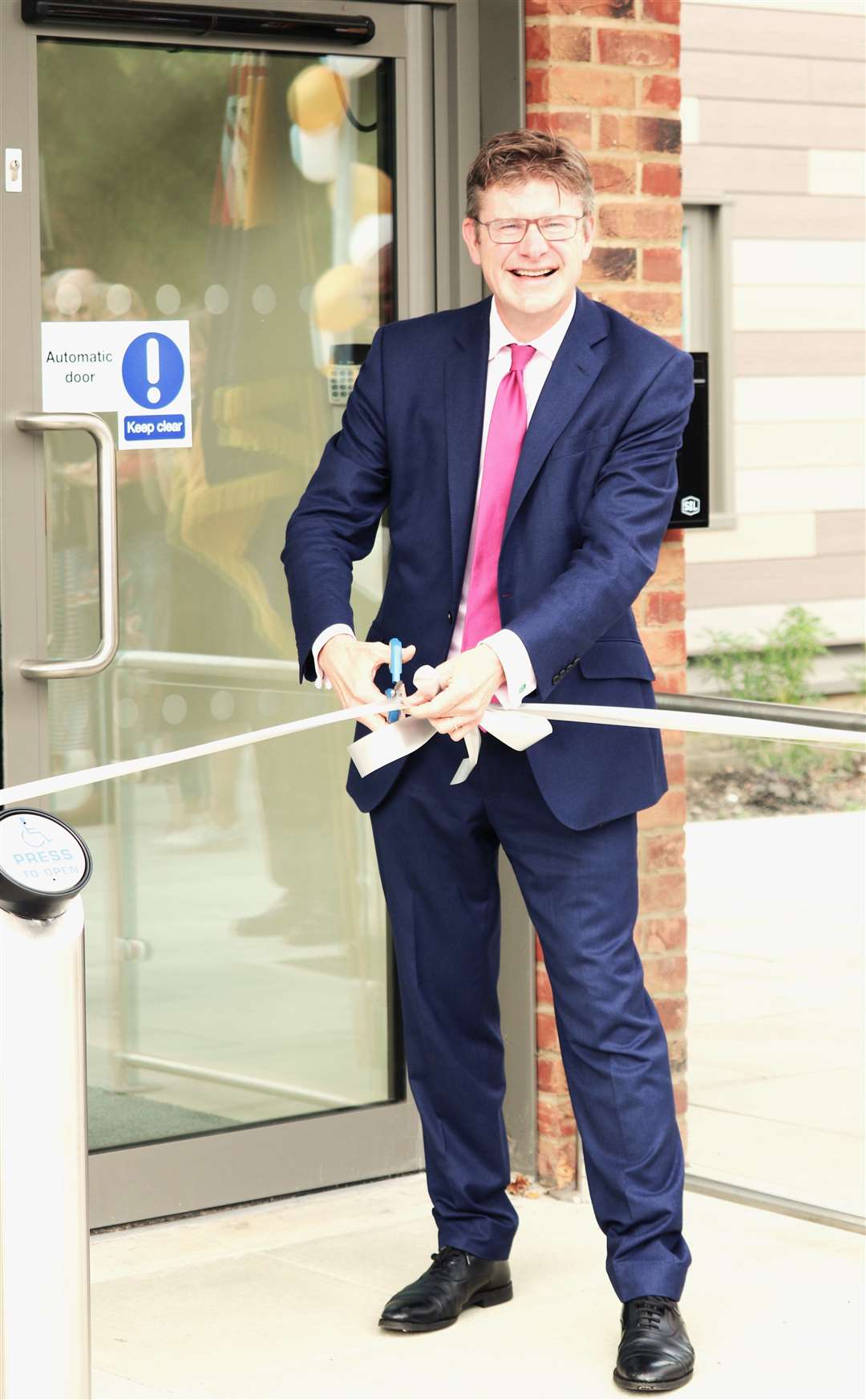 Greg Clark MP cuts the tape Pic Simon Reay