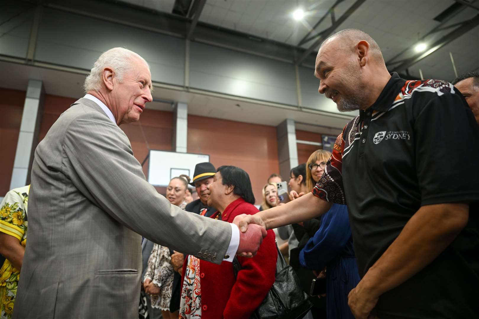 The King meeting members of the Indigenous community during a visit to the National Centre of Indigenous Excellence in Sydney (Victoria Jones/PA)