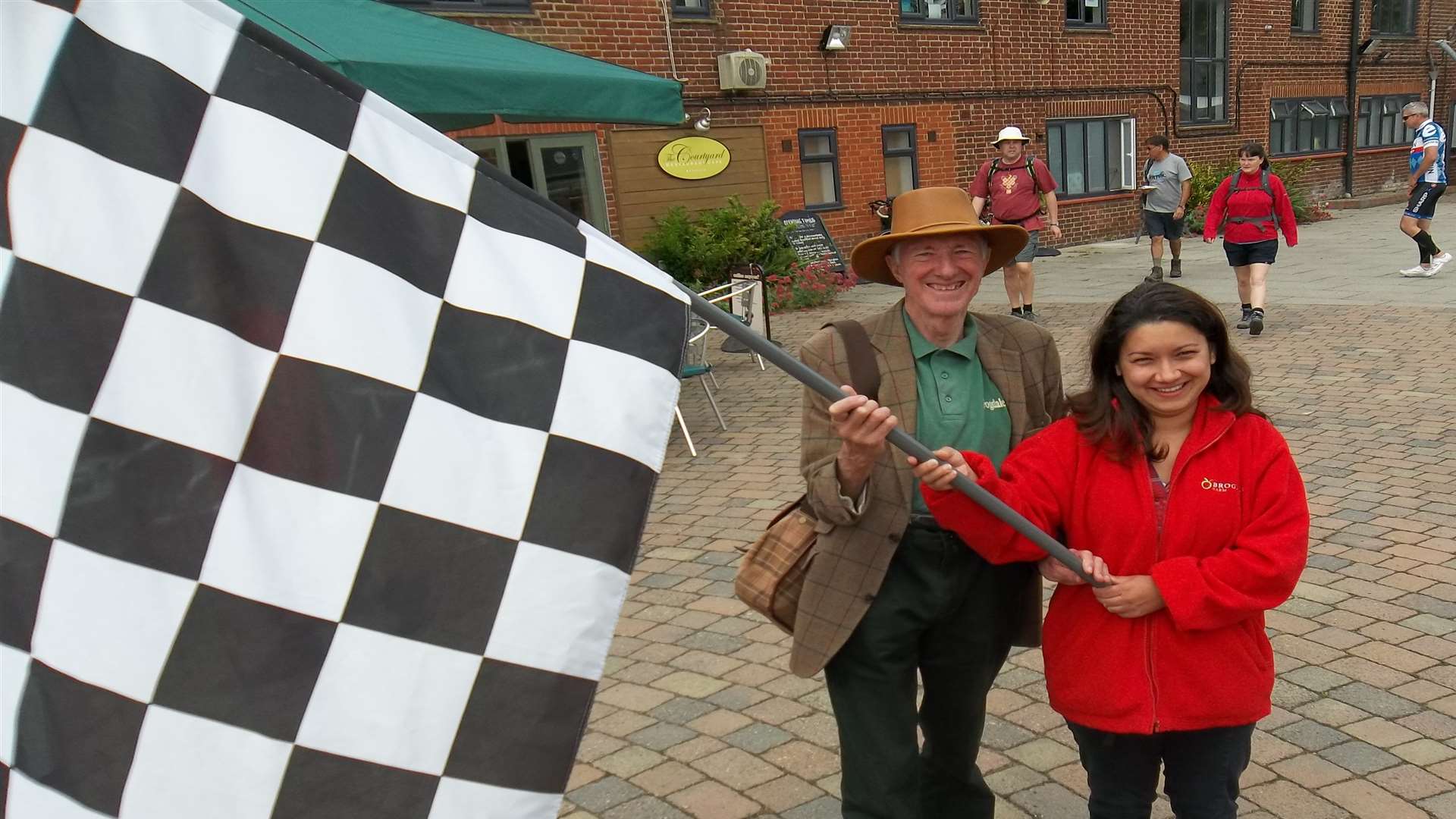 Tour guide Jonathan Fryer along with Christina Alecu, both of Brogdale Collections, start the KM Charity Walk 2014