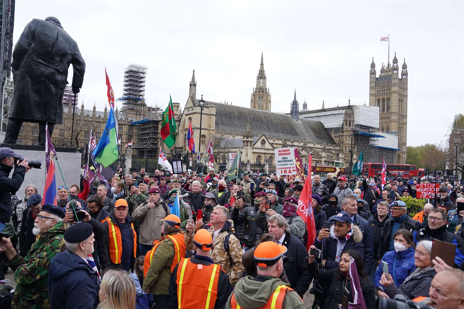 People taking part in the veterans march in London (Steve Parsons/PA)