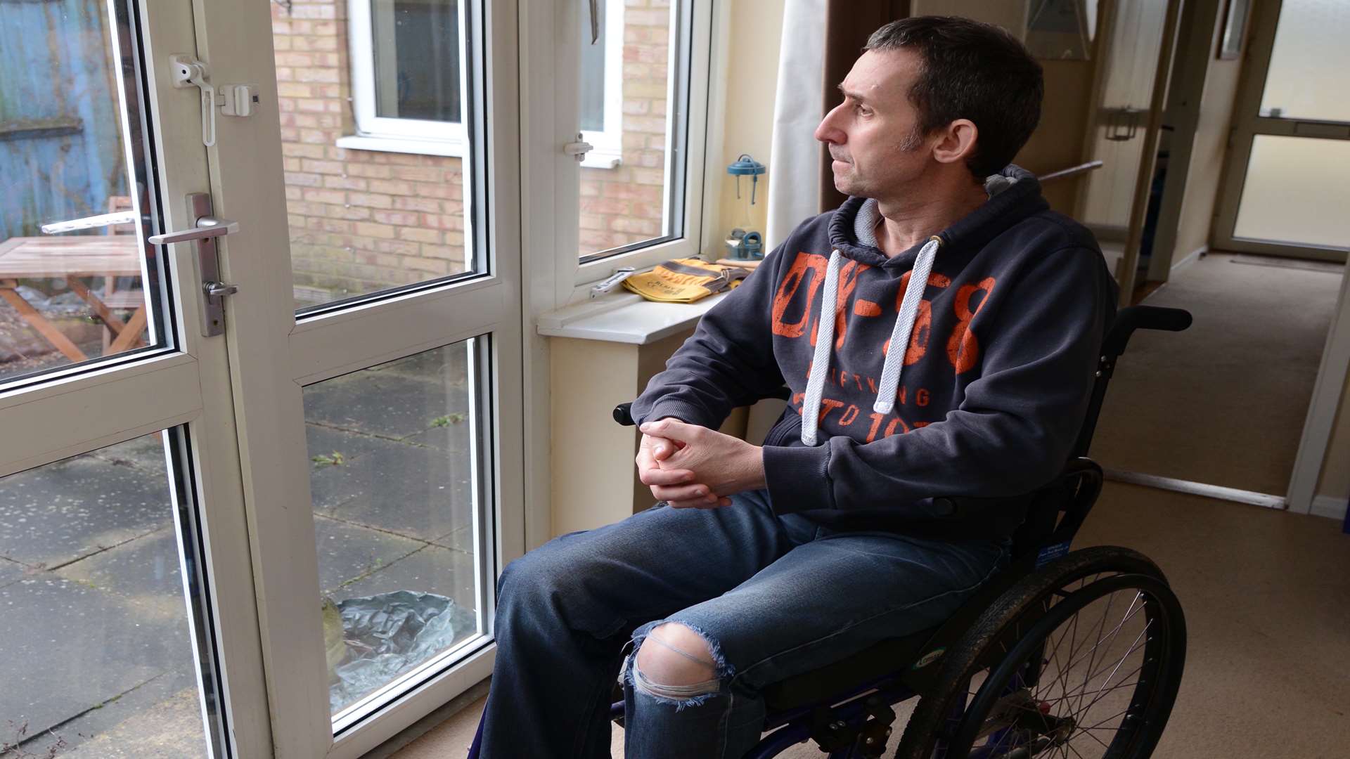 Dan Inwood who has MS and has been told he may have to wait up to two years for adaptations to his house