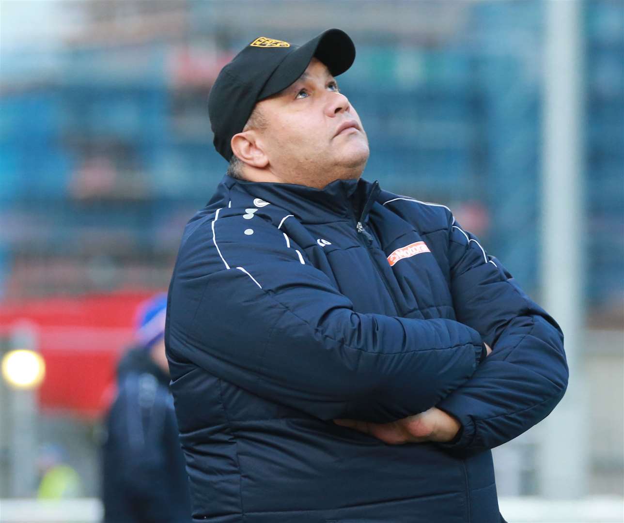 Maidstone United head coach Hakan Hayrettin looks to the skies against Dorking Picture: John Westhrop