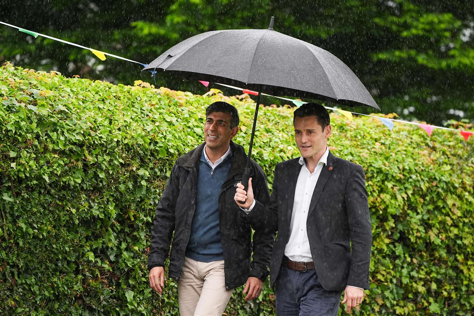 Dr Luke Evans (right) with former prime minister Rishi Sunak (Aaron Chown/PA)