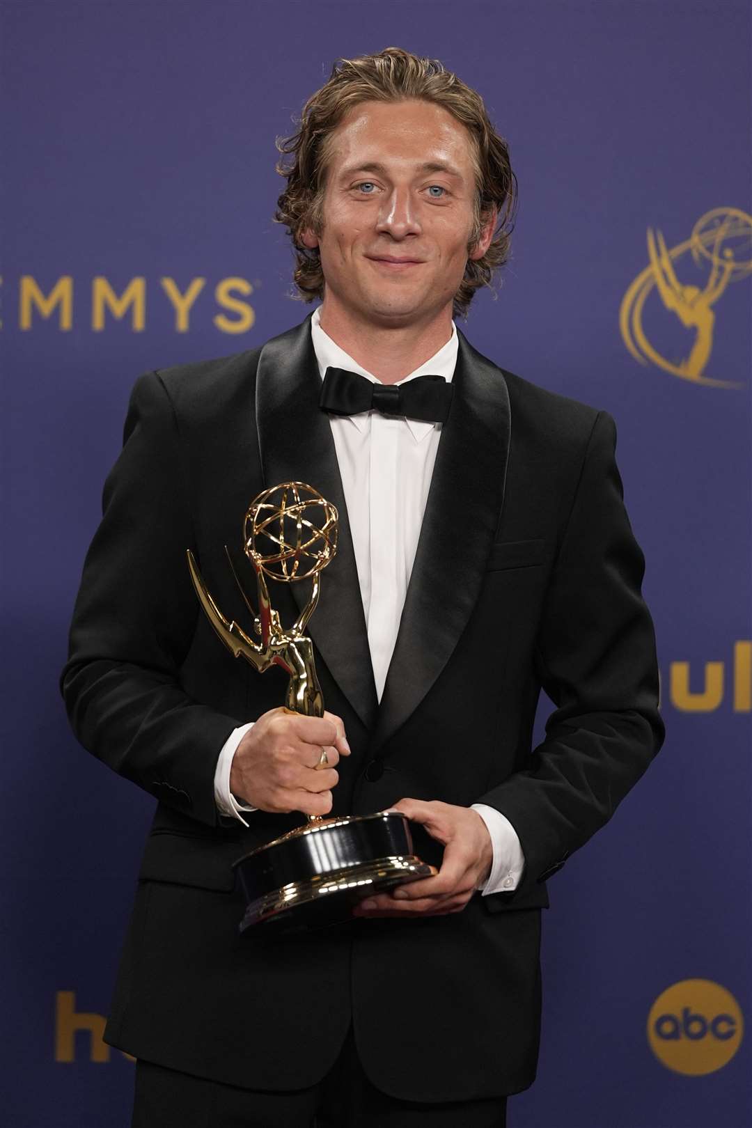 Jeremy Allen White, winner of the award for outstanding lead actor in a comedy series for The Bear, poses in the press room during the 76th Primetime Emmy Awards (Jae C Hong/AP)