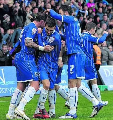 Gillingham players celebrate Danny Kedwell's goal against Stoke