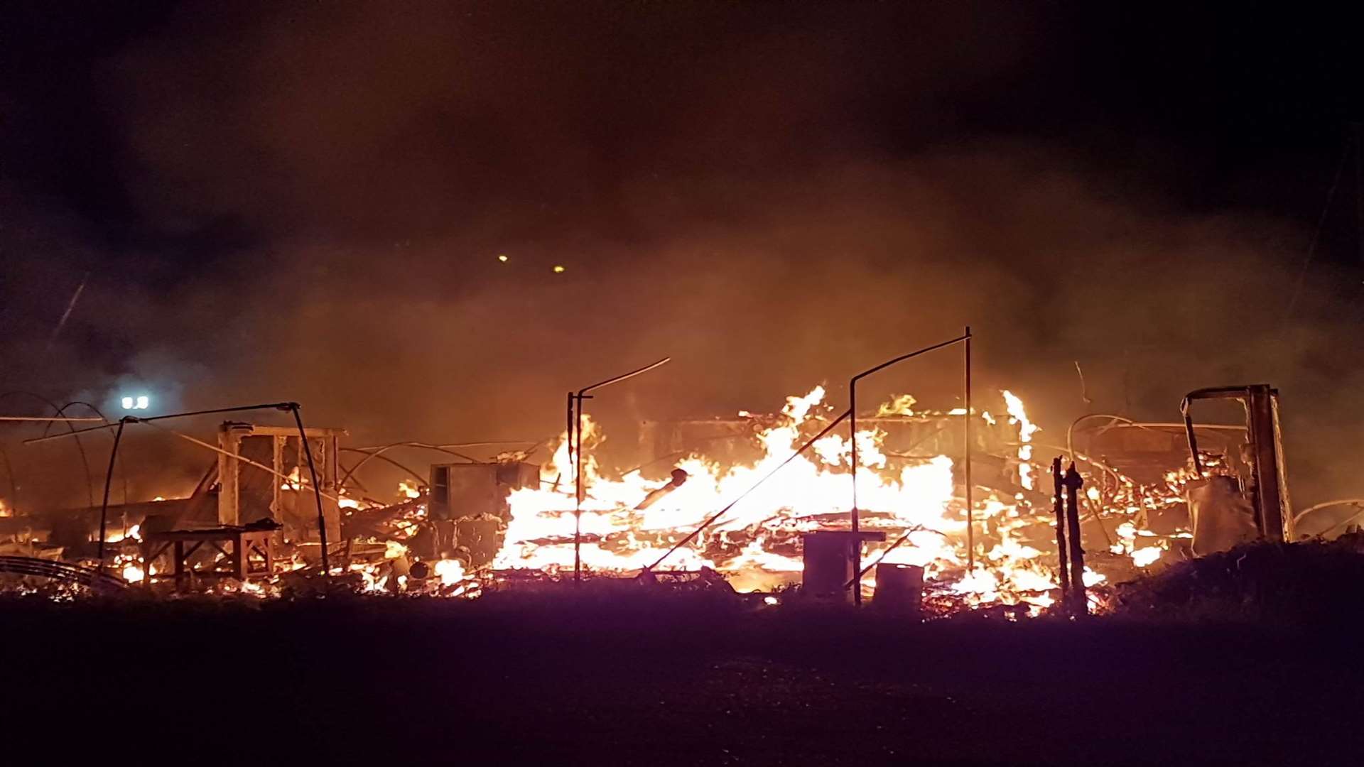 The fire rages at the boatyard. Picture: Dan Salter.
