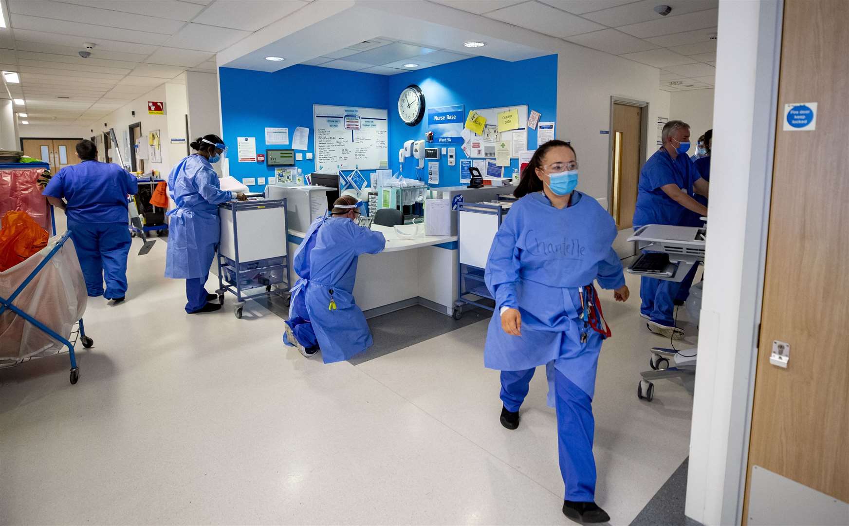 Hospital staff on a Covid-19 ward (Peter Byrne/PA)