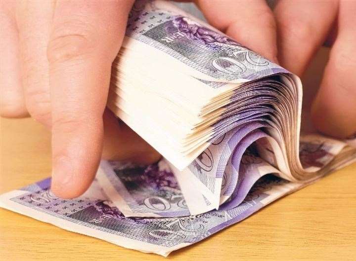 A quantity of cash was stolen. Stock picture