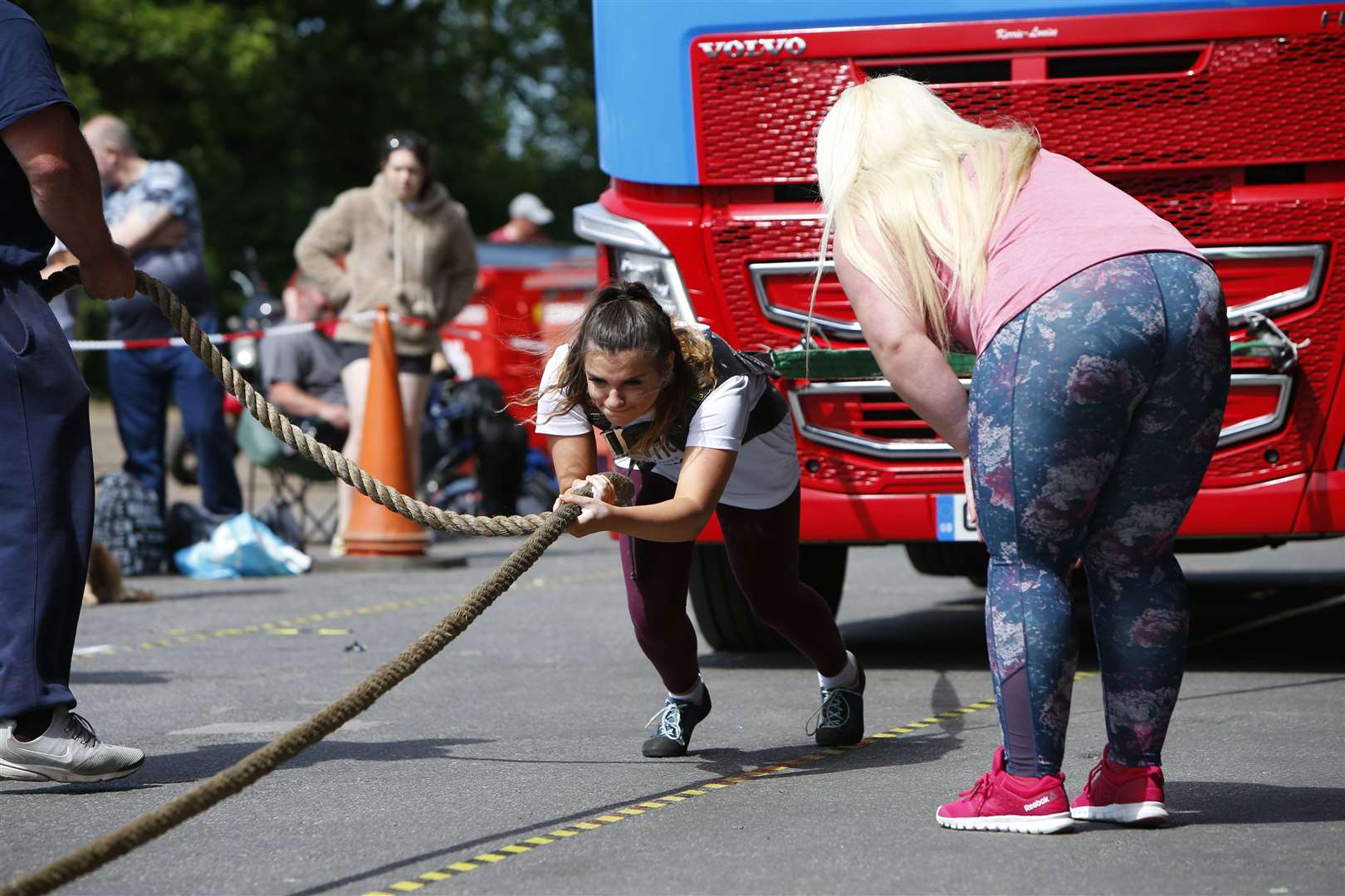 Charlotte Honey doing the truck pull