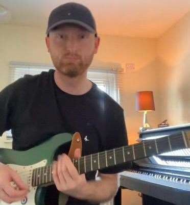 The 28-year-old was a talented musician and regularly played his guitar. Picture: Lisa O'Bray