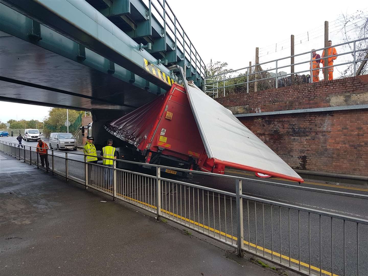 The top of the lorry has collapsed after it hit Newtown Road bridge (18826504)