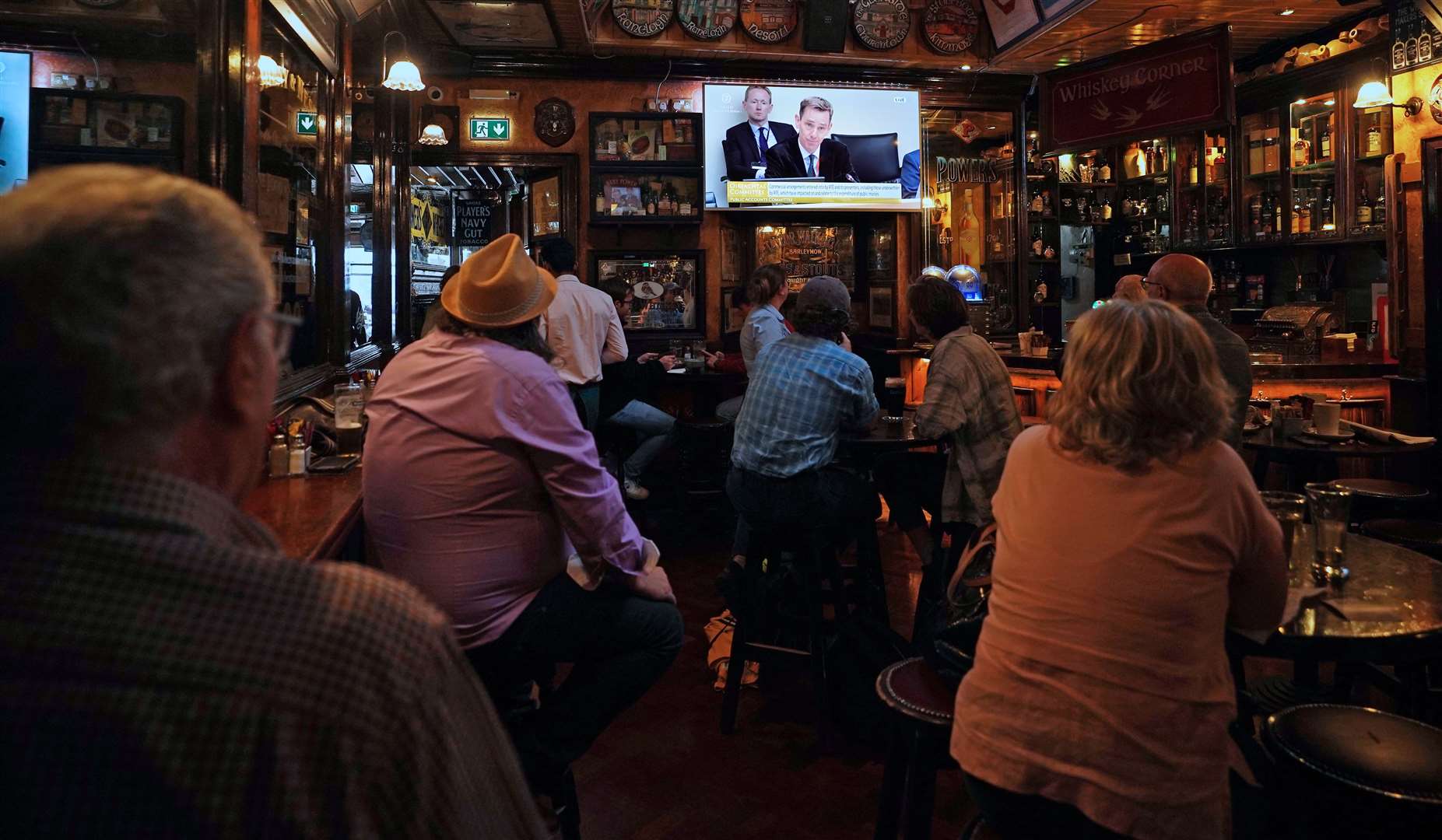 Dublin pubgoers watched former RTE presenter Ryan Tubridy give evidence to a parliamentary committee in July after the national broadcaster admitted mis-stating fees paid to their then-highest-paid star (Niall Carson/PA)