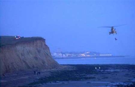 TO THE RESCUE: The woman is winched aboard the RAF Sea King helicopter before being taken to hospital. Picture courtesy RNLI WHITSTABLE