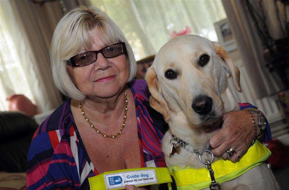 Patricia Poole and her guide dog Zebedee