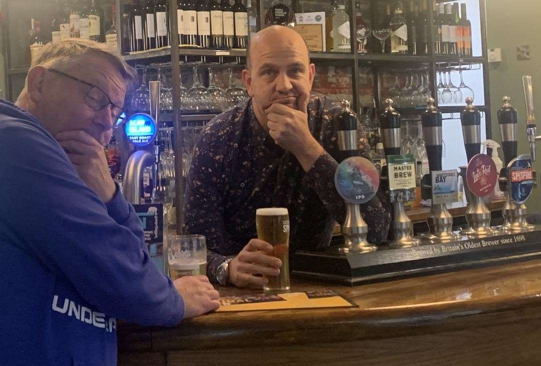 Pub manager Chris Peach (right) with regular Adrian Burke who helped him plan his original route