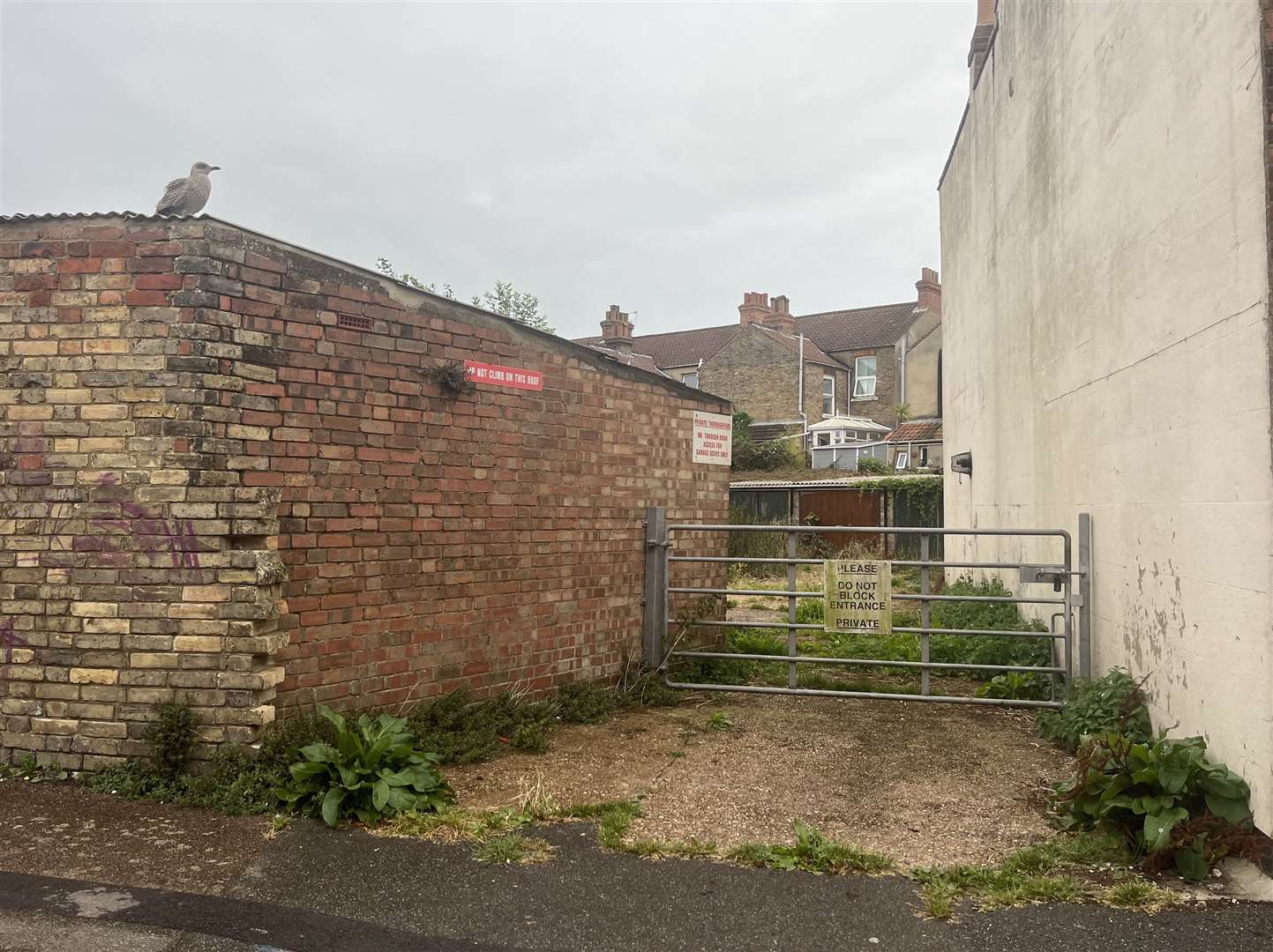 The existing derelict garages will be demolished as part of plans for the brownfield site