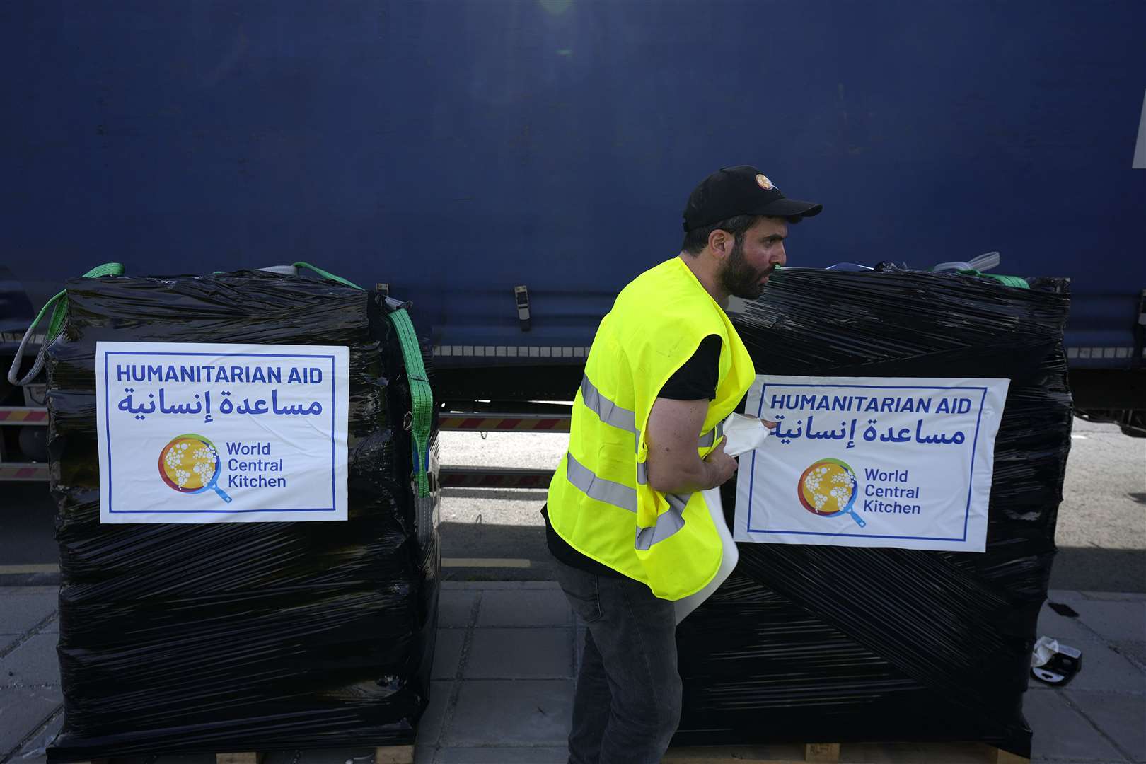 A member of the World Central Kitchen prepares a pallet with the humanitarian aid for transport to the port of Larnaca from where it was intended for shipping to Gaza (Petros Karadjias/AP)