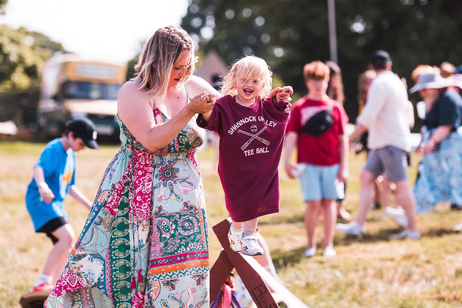 People enjoying themselves in the sun at the Black Deer festival. Picture: @CaitlinMogridge/Black Deer Festival 2022