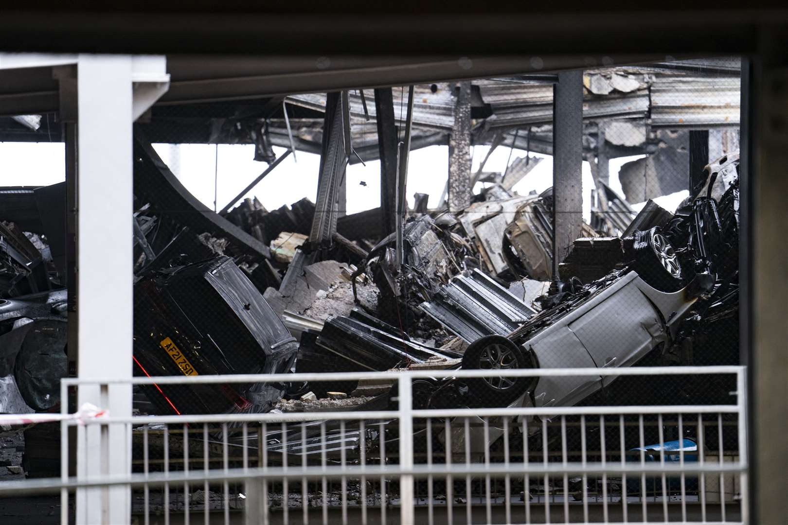 The scene at Luton Airport after a fire ripped through level three of the airport’s Terminal Car Park 2, causing it to collapse (Jordan Pettitt/PA)