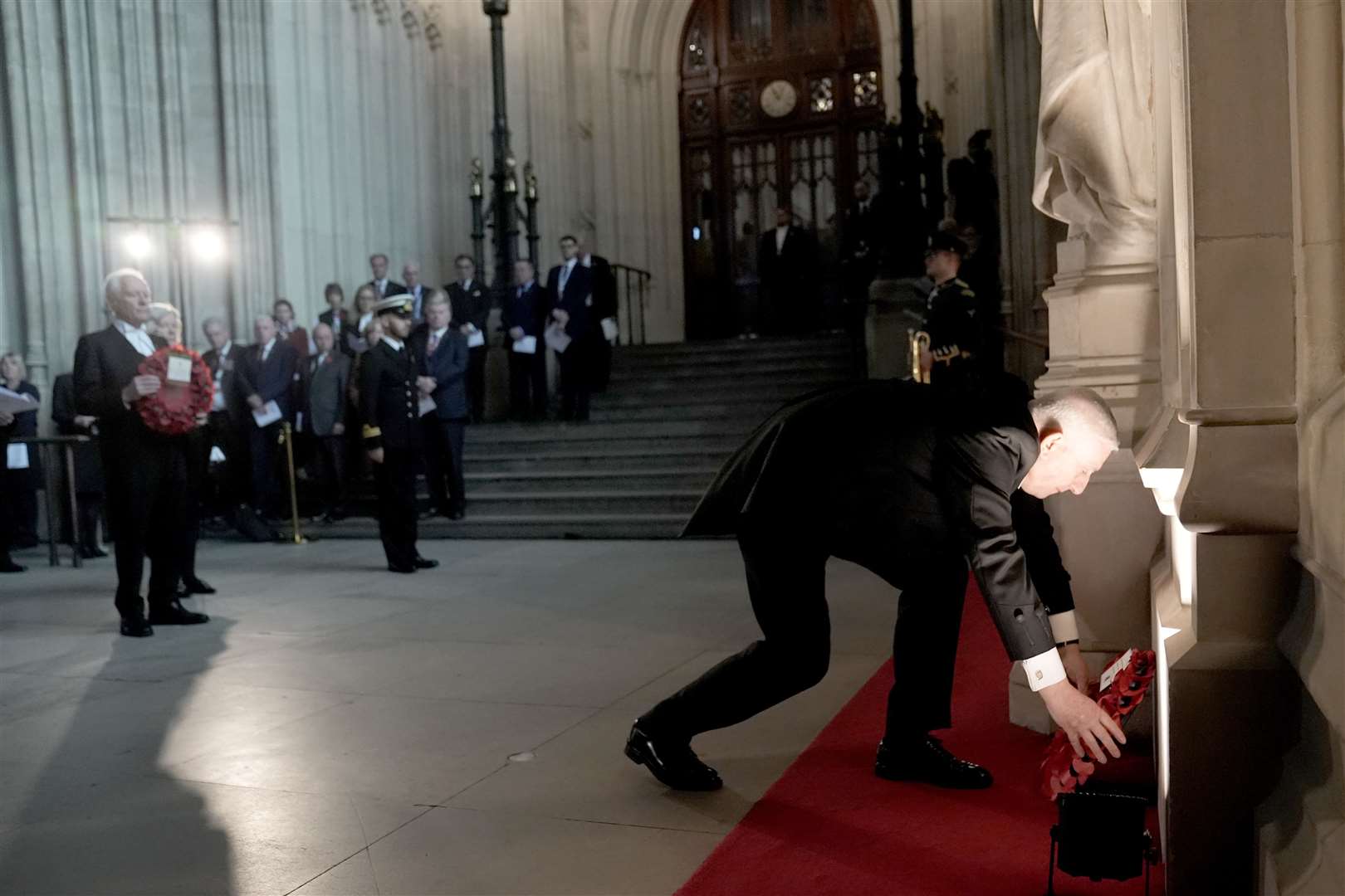 Speaker of the House of Commons Sir Lindsay Hoyle lays a wreath (Stefan Rousseau/PA)