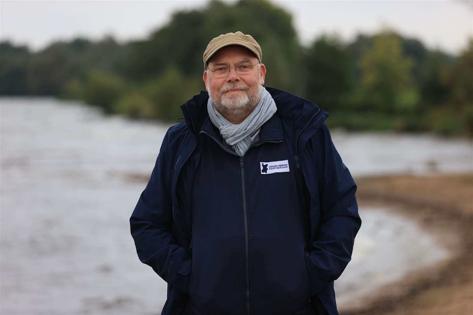 Gerry Darby, Lough Neagh Partnership manager on the shore of Ballyronan beach (Liam McBurney/PA)